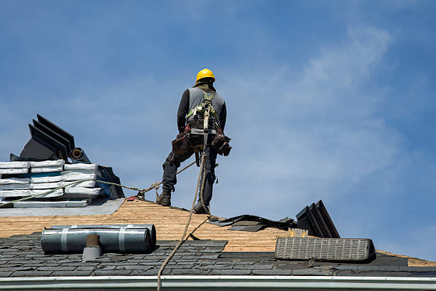 Professional Roofing technician working in Ellis, KS